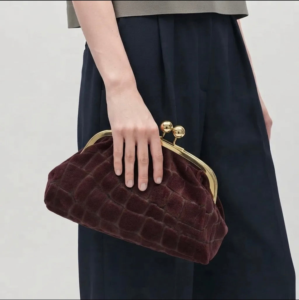 THE BURGUNDY CLUTCH