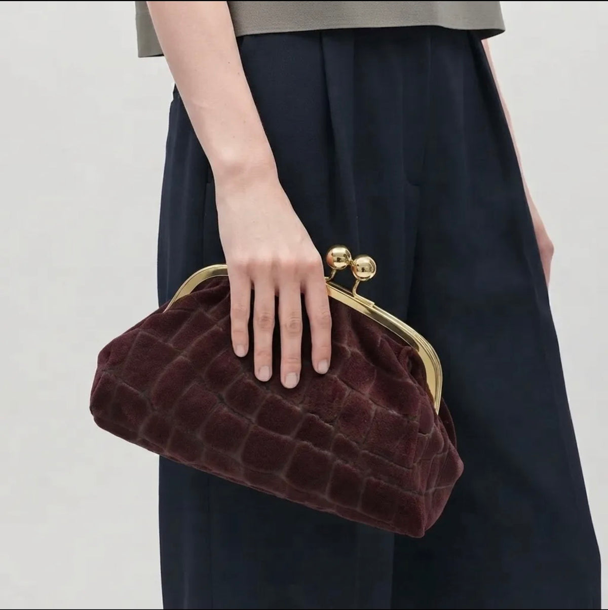 THE BURGUNDY CLUTCH