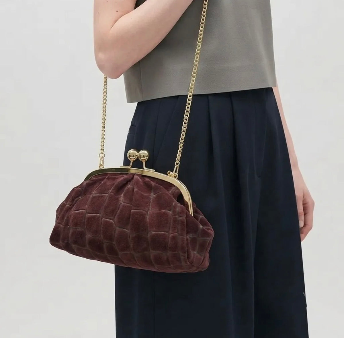 THE BURGUNDY CLUTCH